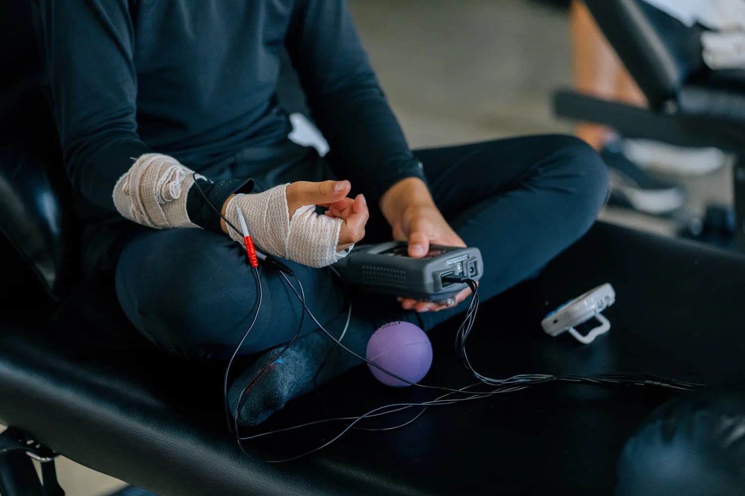 ARP neuromuscular therapy device in use at Range Sports Therapy